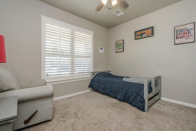 carpeted bedroom with ceiling fan