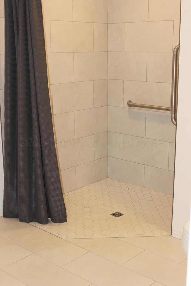 bathroom with a shower with curtain