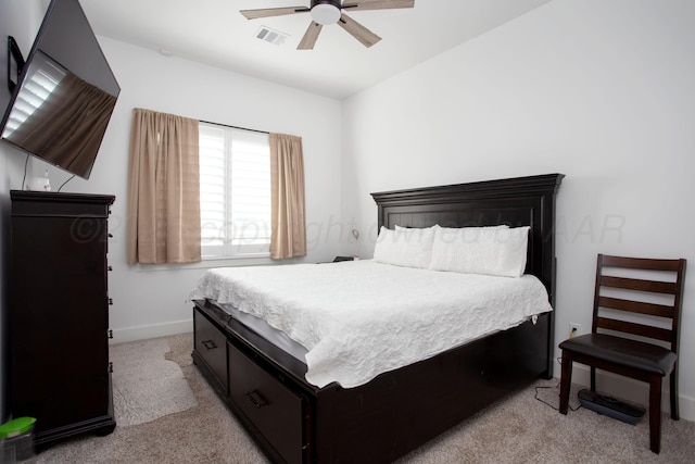 9800 Barton Springs Dr, Amarillo, TX 79119 - bedroom with light colored carpet, baseboards, and a ceiling fan