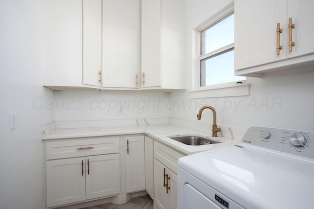 9800 Barton Springs Dr, Amarillo, TX 79119 - laundry room featuring washer / clothes dryer and cabinet space