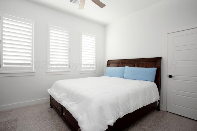 9800 Barton Springs Dr, Amarillo, TX 79119 - carpeted bedroom featuring baseboards and a ceiling fan