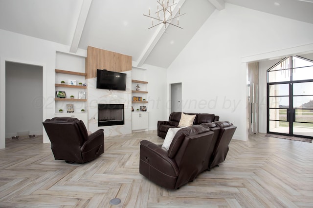 9800 Barton Springs Dr, Amarillo, TX 79119 - living room with high vaulted ceiling, beamed ceiling, a chandelier, a high end fireplace, and baseboards