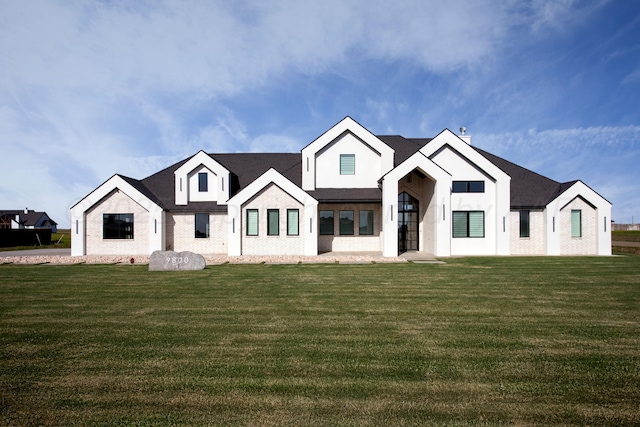 9800 Barton Springs Dr, Amarillo, TX 79119 - modern farmhouse style home featuring a front lawn