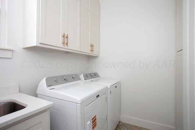 9800 Barton Springs Dr, Amarillo, TX 79119 - laundry area featuring cabinet space and washer and dryer