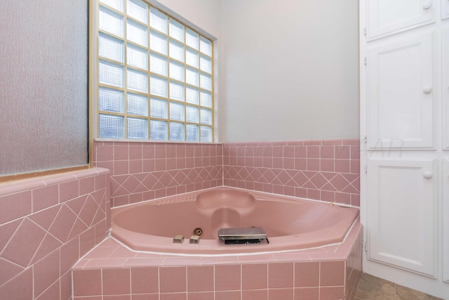 full bathroom with a garden tub