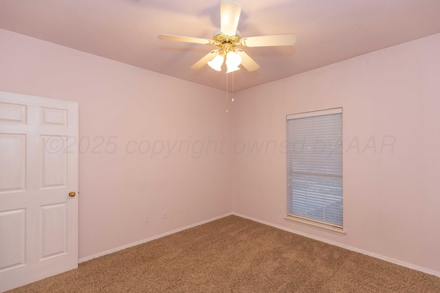 spare room with baseboards, carpet floors, and ceiling fan