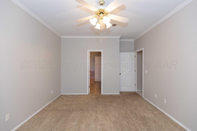 unfurnished bedroom featuring a ceiling fan, carpet, baseboards, and ornamental molding