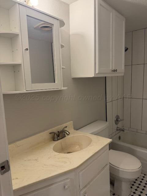 1602 N Hughes St, Amarillo, TX 79107 - bathroom with vanity and shower / bathtub combination