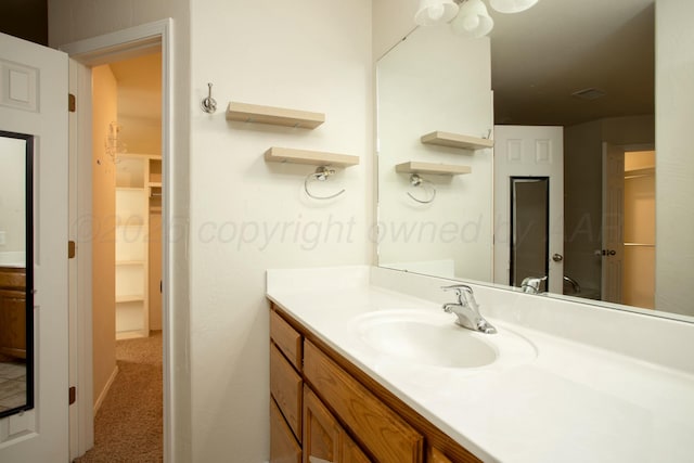 bathroom featuring visible vents and vanity