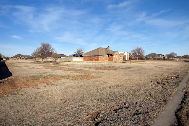 view of yard with fence