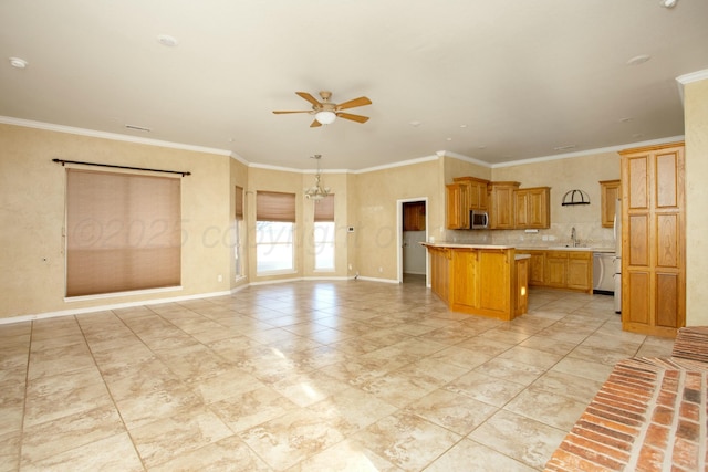 kitchen featuring ornamental molding, light countertops, appliances with stainless steel finishes, ceiling fan with notable chandelier, and open floor plan