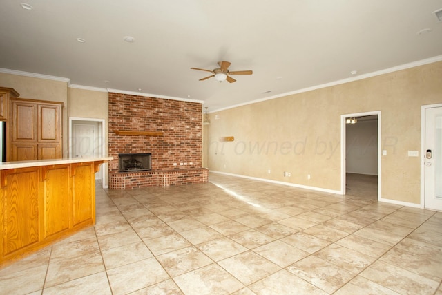 unfurnished living room featuring light tile patterned floors, a brick fireplace, crown molding, and ceiling fan