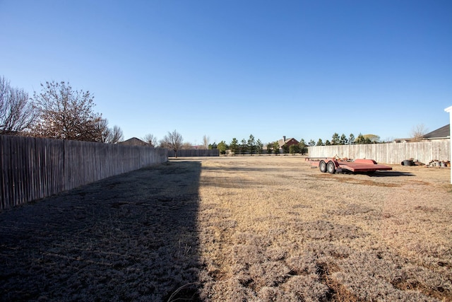 view of yard featuring a fenced backyard