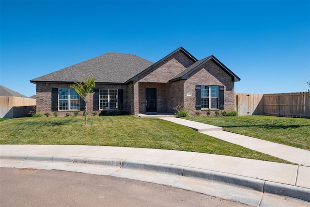 view of front of home with a front yard