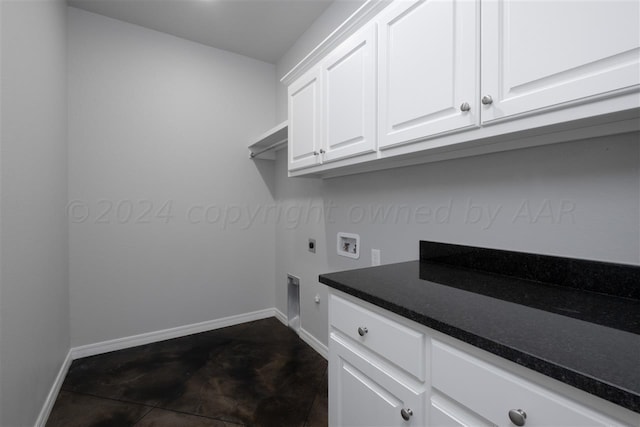 laundry room with hookup for a washing machine, cabinets, and hookup for an electric dryer