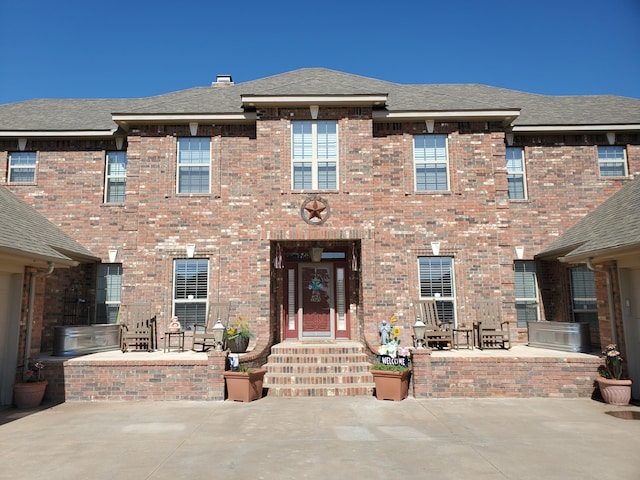 view of front of property with a patio area