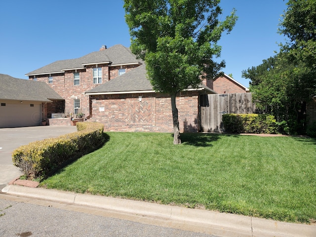 view of front facade with a front yard