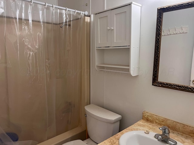 full bathroom featuring vanity, toilet, and shower / bath combo with shower curtain