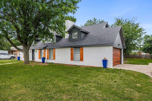 2421 Duncan St, Pampa, TX 79065 - view of front of house with driveway, a chimney, a shingled roof, brick siding, and an attached garage
