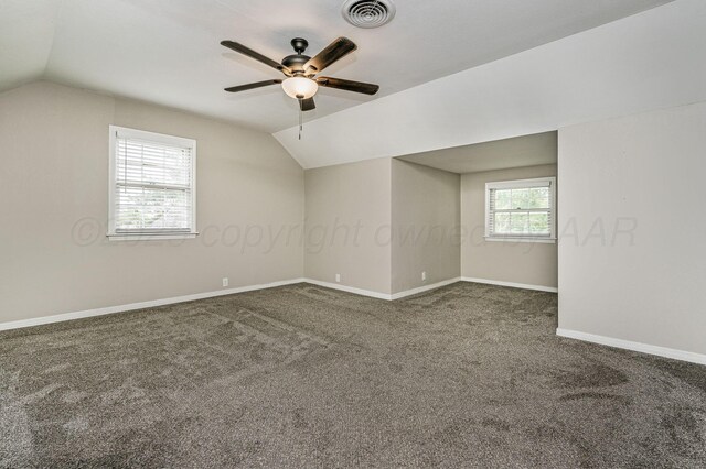 2421 Duncan St, Pampa, TX 79065 - bonus room with vaulted ceiling, carpet floors, ceiling fan, and baseboards