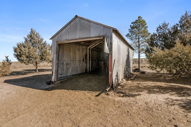 view of outbuilding with a rural view