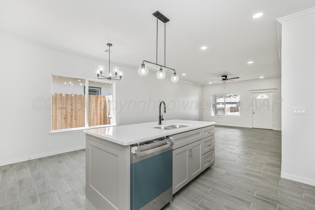 307 S Tennessee St, Amarillo, TX 79106 - kitchen featuring dishwashing machine, light wood-style flooring, ceiling fan with notable chandelier, and a sink