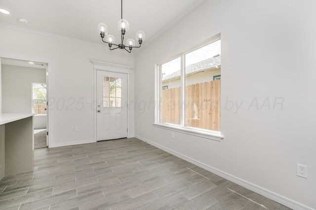 307 S Tennessee St, Amarillo, TX 79106 - interior space with baseboards, a chandelier, ornamental molding, and light wood-style floors