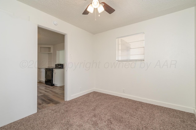 4106 S Jackson St, Amarillo, TX 79110 - unfurnished room featuring light colored carpet, a ceiling fan, a textured ceiling, and a smoke detector