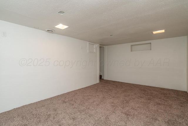 4106 S Jackson St, Amarillo, TX 79110 - unfurnished room featuring carpet and a textured ceiling