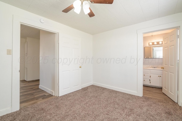 4106 S Jackson St, Amarillo, TX 79110 - unfurnished bedroom with light carpet, light wood-style floors, ensuite bath, and a ceiling fan