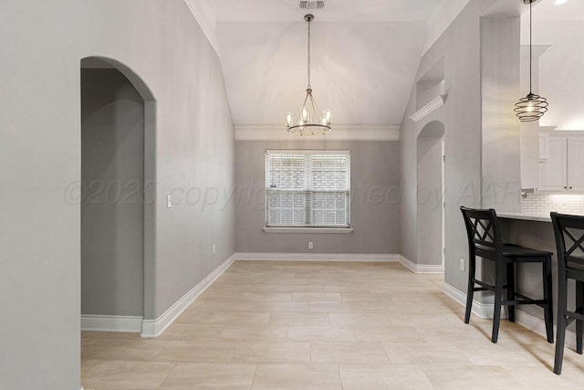 6501 Glenwood Dr, Amarillo, TX 79119 - unfurnished dining area featuring lofted ceiling, visible vents, arched walkways, baseboards, and a chandelier