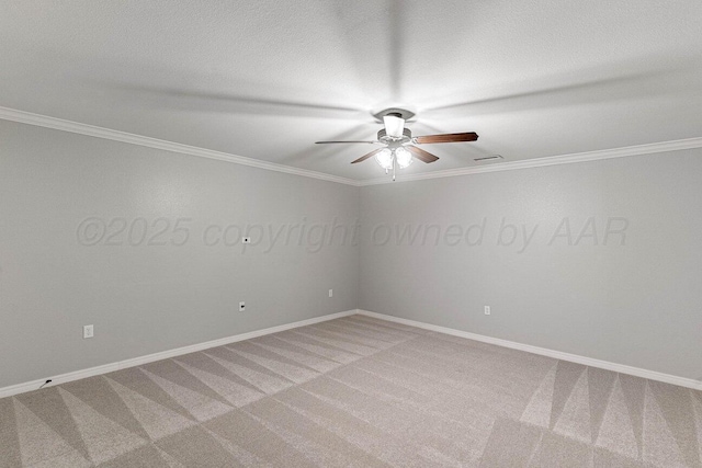 6501 Glenwood Dr, Amarillo, TX 79119 - unfurnished room featuring visible vents, baseboards, a ceiling fan, crown molding, and carpet floors