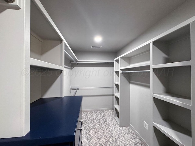 6501 Glenwood Dr, Amarillo, TX 79119 - walk in closet featuring tile patterned floors and visible vents