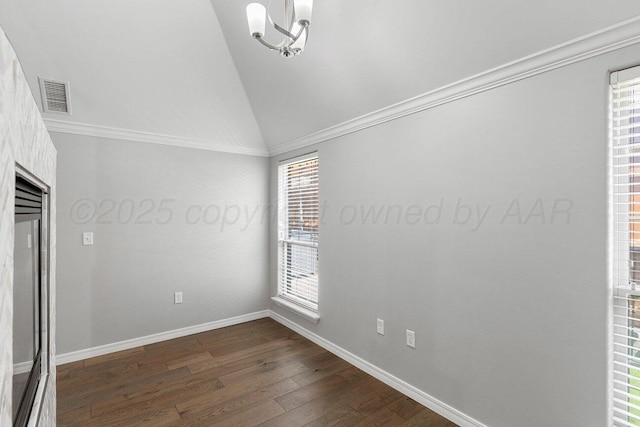 6501 Glenwood Dr, Amarillo, TX 79119 - unfurnished room with lofted ceiling, baseboards, visible vents, and dark wood-style floors