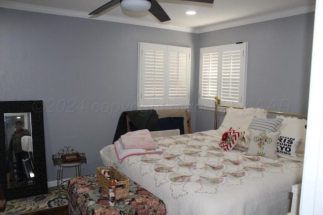 bedroom with ceiling fan and ornamental molding