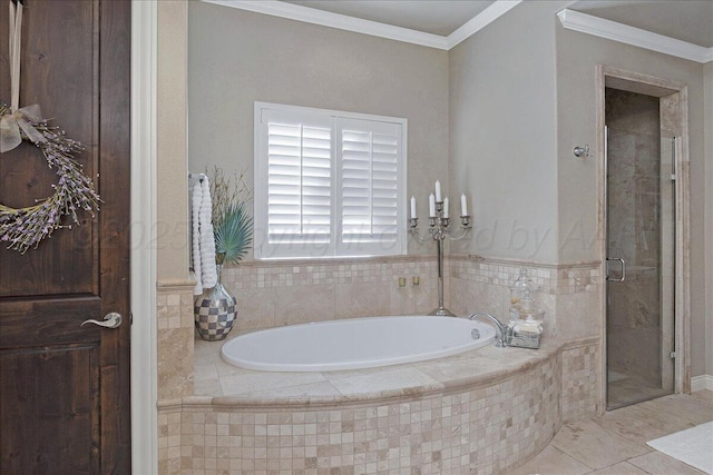 5708 Barrington Ct, Amarillo, TX 79119 - bathroom with a shower stall, a bath, and crown molding