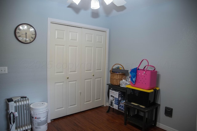 503 Maple Ave, Panhandle, TX 79068 - bedroom with dark wood-style floors, a closet, ceiling fan, and radiator heating unit