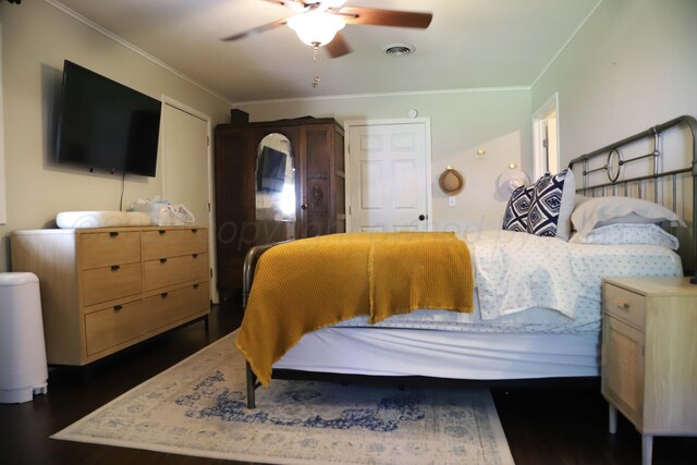 3603 S Lamar St, Amarillo, TX 79109 - bedroom featuring crown molding, dark wood-type flooring, and ceiling fan