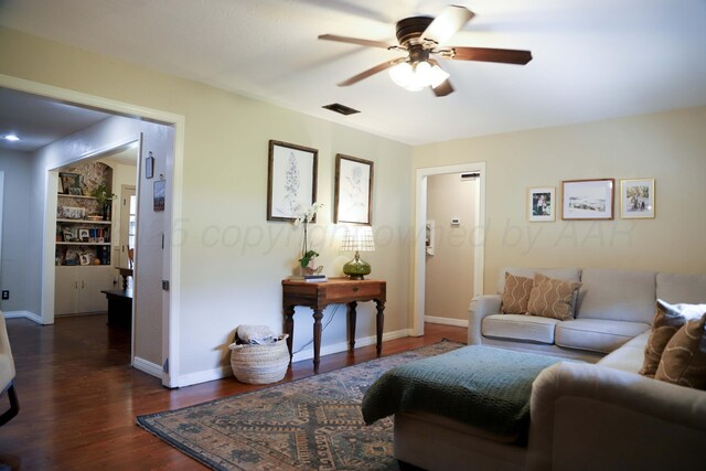 3603 S Lamar St, Amarillo, TX 79109 - living area featuring ceiling fan and dark wood-type flooring