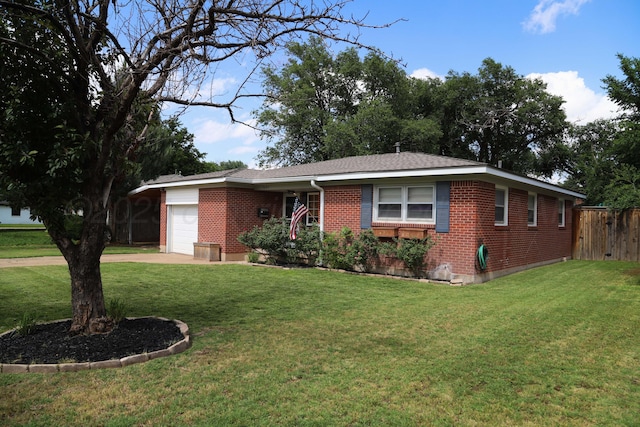 3603 S Lamar St, Amarillo, TX 79109 - ranch-style house featuring brick siding, a garage, driveway, and roof with shingles