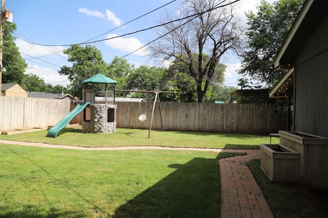 3603 S Lamar St, Amarillo, TX 79109 - fenced backyard featuring a playground
