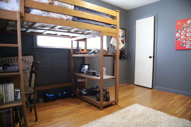 3603 S Lamar St, Amarillo, TX 79109 - bedroom featuring wood finished floors and baseboards