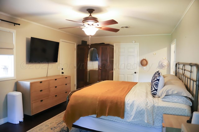 3603 S Lamar St, Amarillo, TX 79109 - bedroom featuring ornamental molding, dark wood-style flooring, and ceiling fan