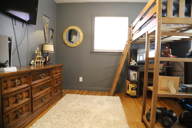 3603 S Lamar St, Amarillo, TX 79109 - bedroom with light wood-type flooring
