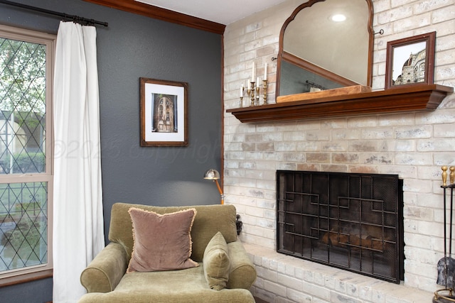907 Broadmoor St, Amarillo, TX 79106 - sitting room with a brick fireplace, ornamental molding, and a textured wall