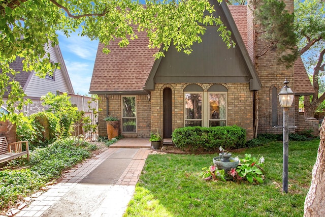 907 Broadmoor St, Amarillo, TX 79106 - view of front facade with roof with shingles and brick siding