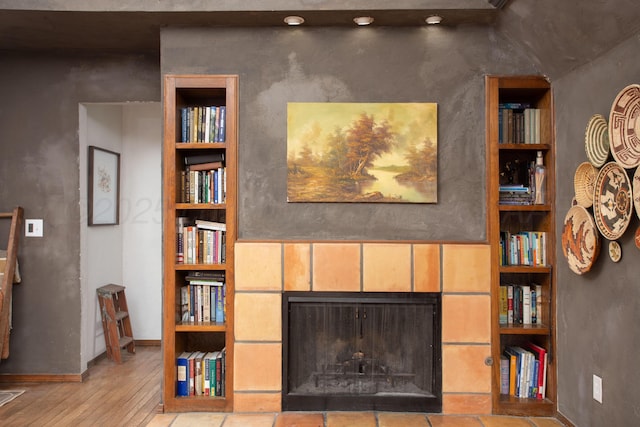 907 Broadmoor St, Amarillo, TX 79106 - detailed view of a fireplace, built in features, and wood finished floors