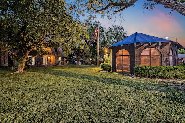 907 Broadmoor St, Amarillo, TX 79106 - view of grassy yard with a greenhouse
