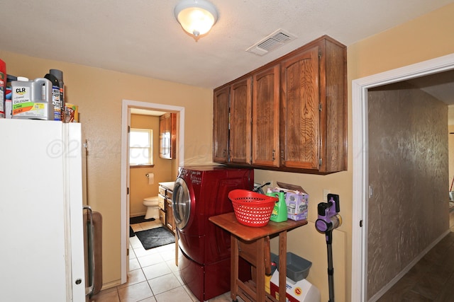 washroom featuring light tile patterned flooring