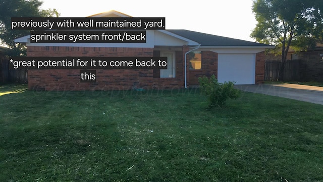 exterior space featuring brick siding, a front yard, concrete driveway, and an attached garage